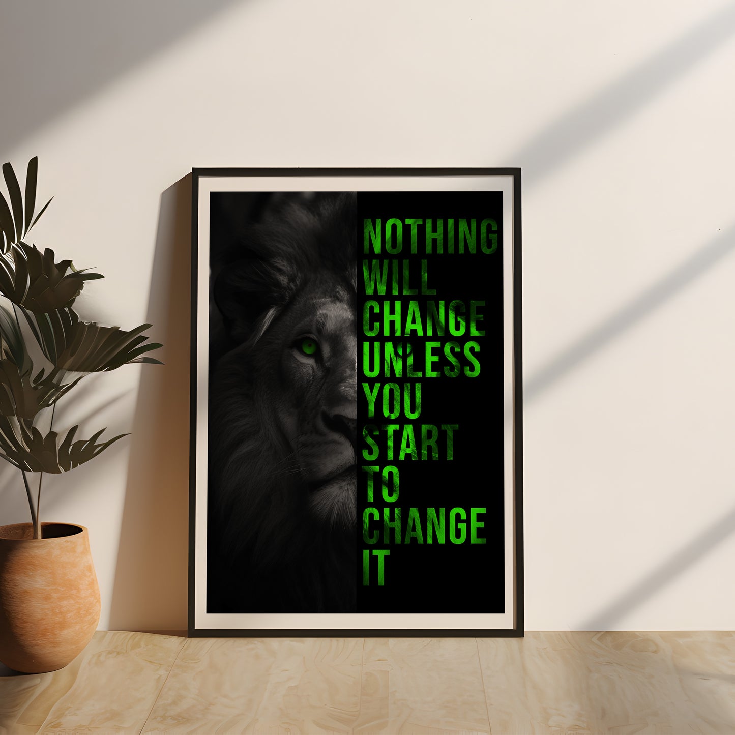 Elegantes gerahmtes Motivationsposter mit Löwenkopf und inspirierender Botschaft: 'Nothing will change unless you start to change it'. Perfekt als Wanddeko für Büro oder Wohnzimmer. Hochwertiger Druck in stilvollem Schwarz-Grün für eine kraftvolle Atmosphäre.